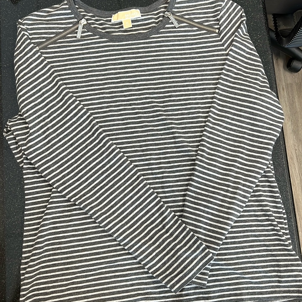 Michael Kors  ladies, good condition, zipper detail at top. Zippers work